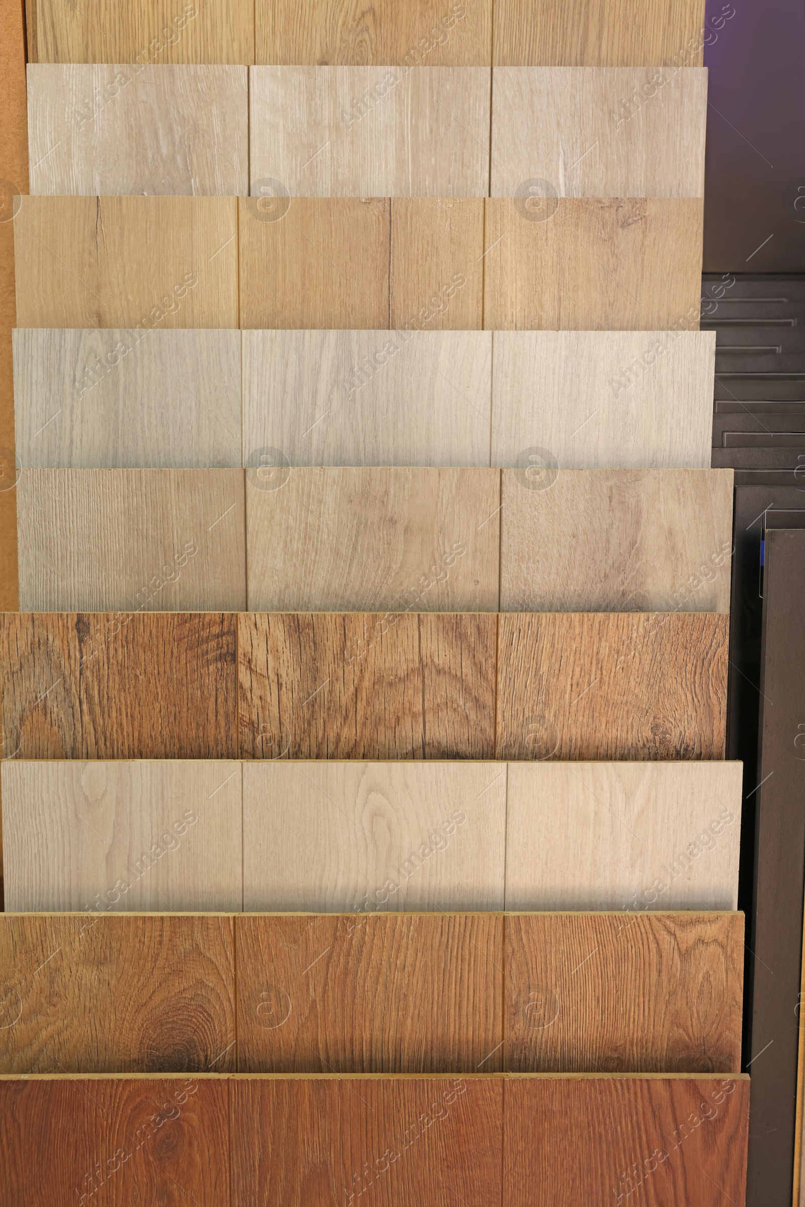 Photo of Many different samples of wooden flooring in store