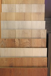 Photo of Many different samples of wooden flooring in store