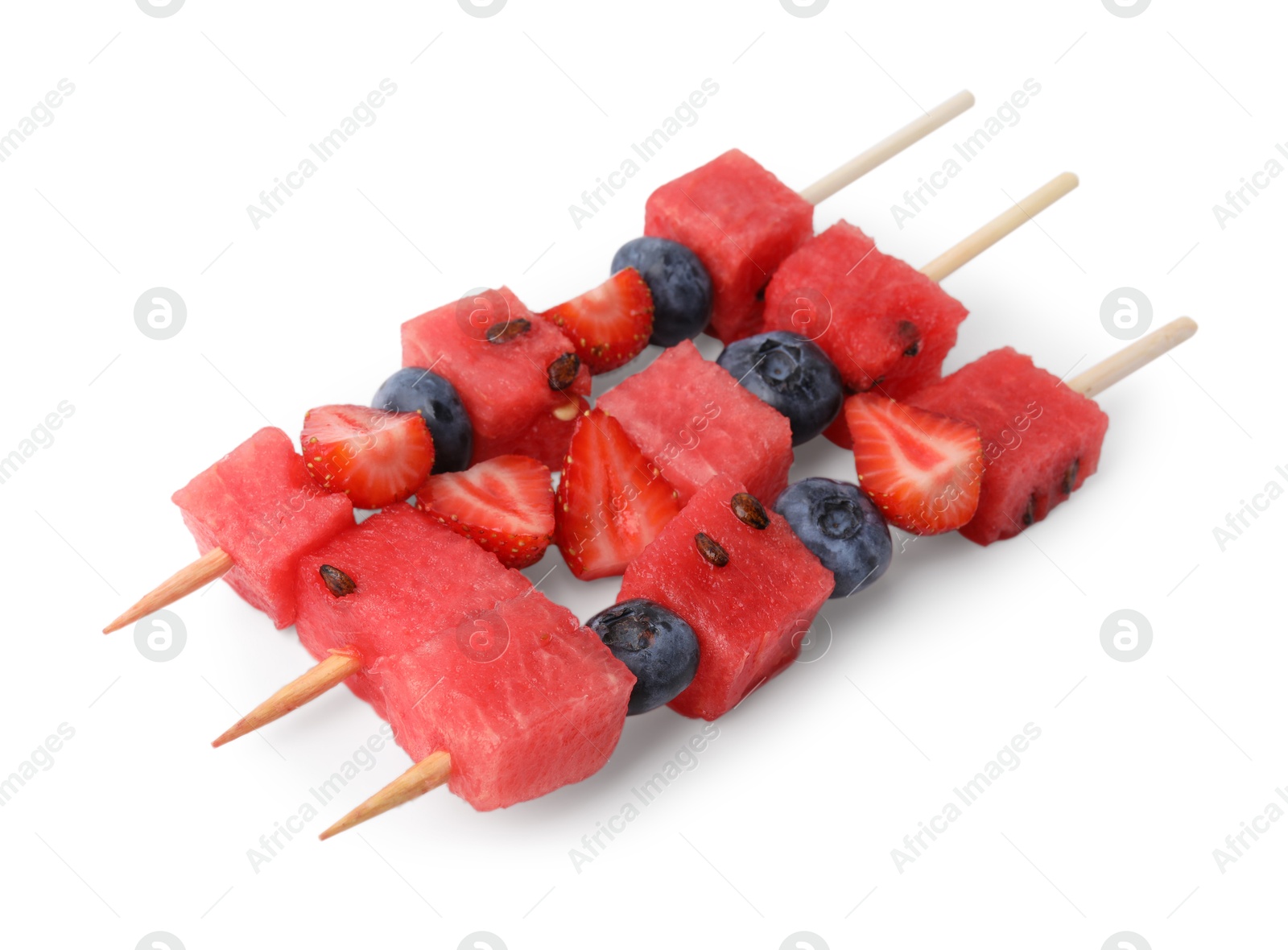 Photo of Skewers with tasty watermelon, blueberries and strawberries isolated on white