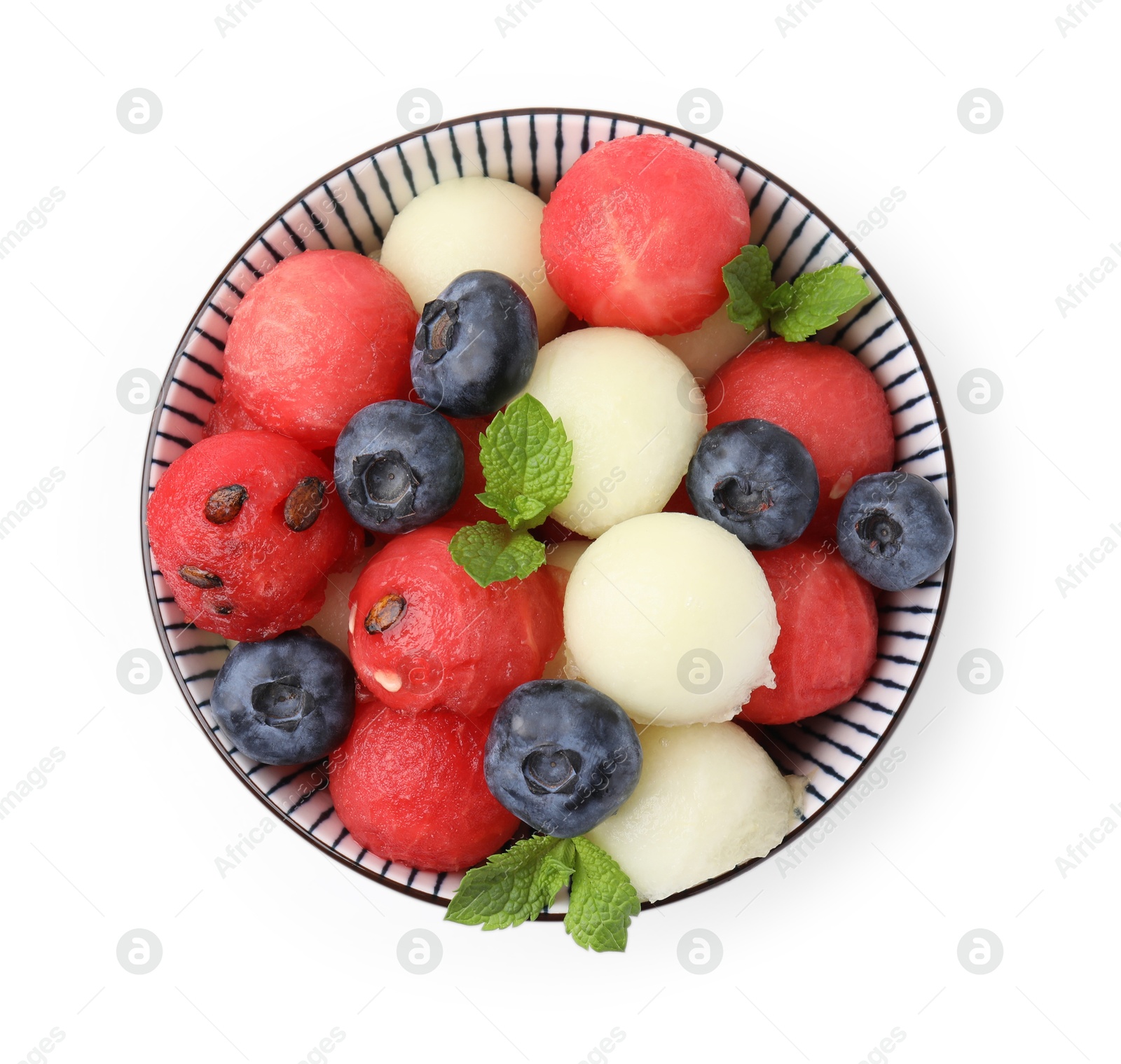 Photo of Tasty watermelon and melon balls with blueberries in bowl isolated on white, top view