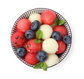 Photo of Tasty watermelon and melon balls with blueberries in bowl isolated on white, top view