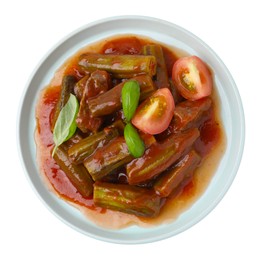 Photo of Tasty stew with okra, tomato sauce and basil isolated on white, top view