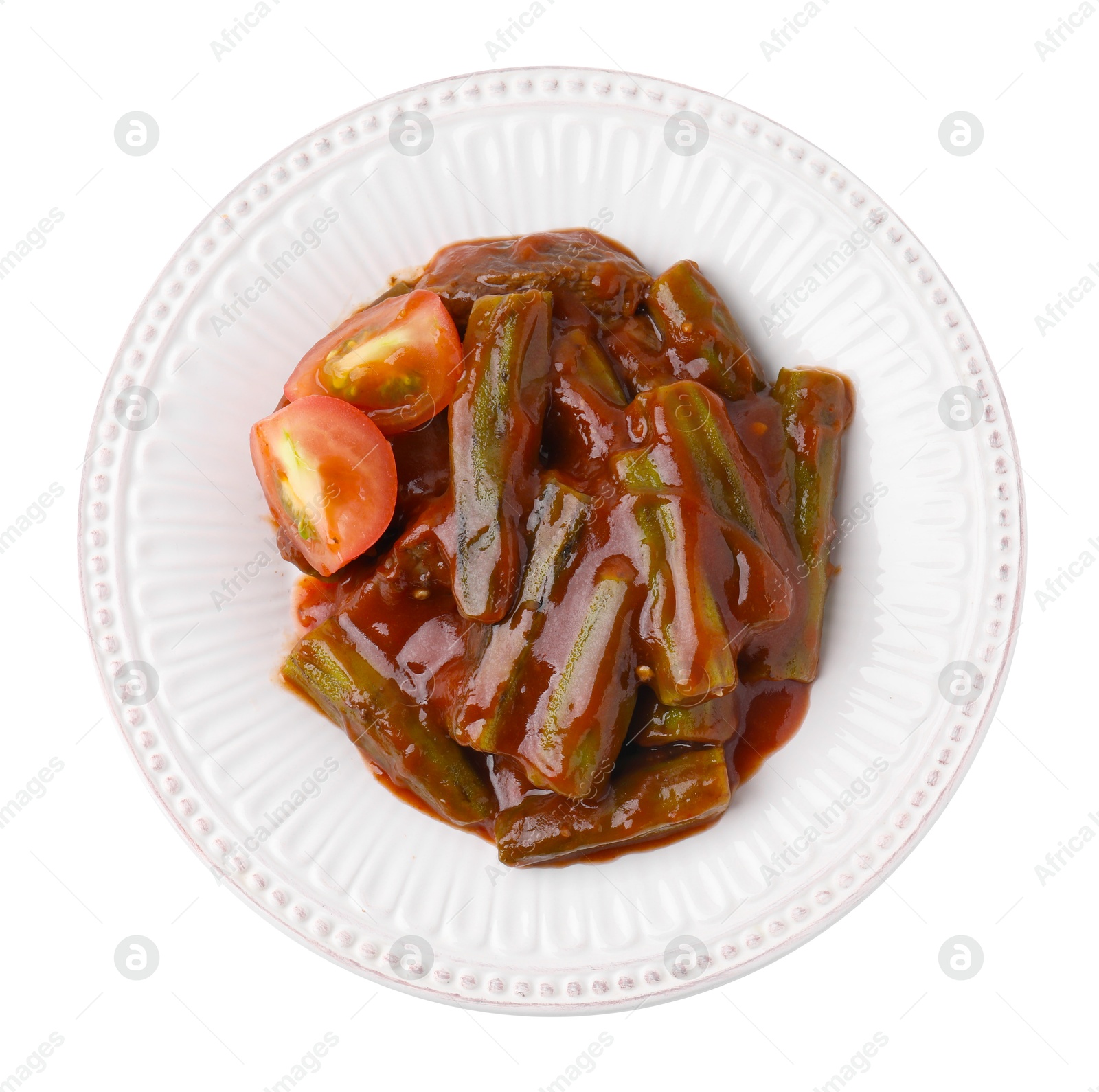 Photo of Tasty stew with okra and tomato sauce isolated on white, top view