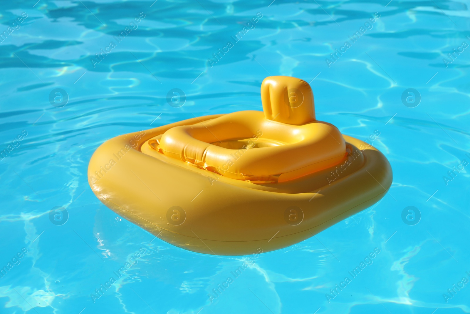 Photo of Yellow float in swimming pool at luxury resort