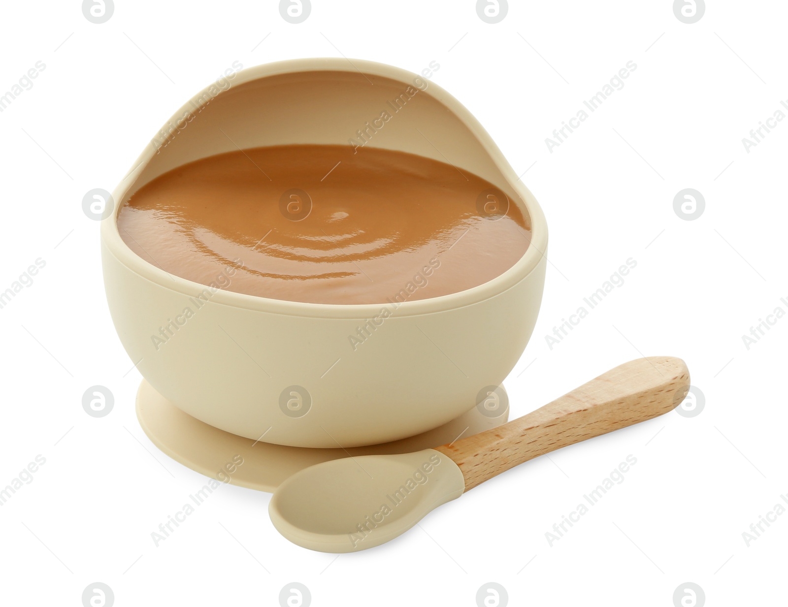 Photo of Tasty baby food in bowl and spoon isolated on white