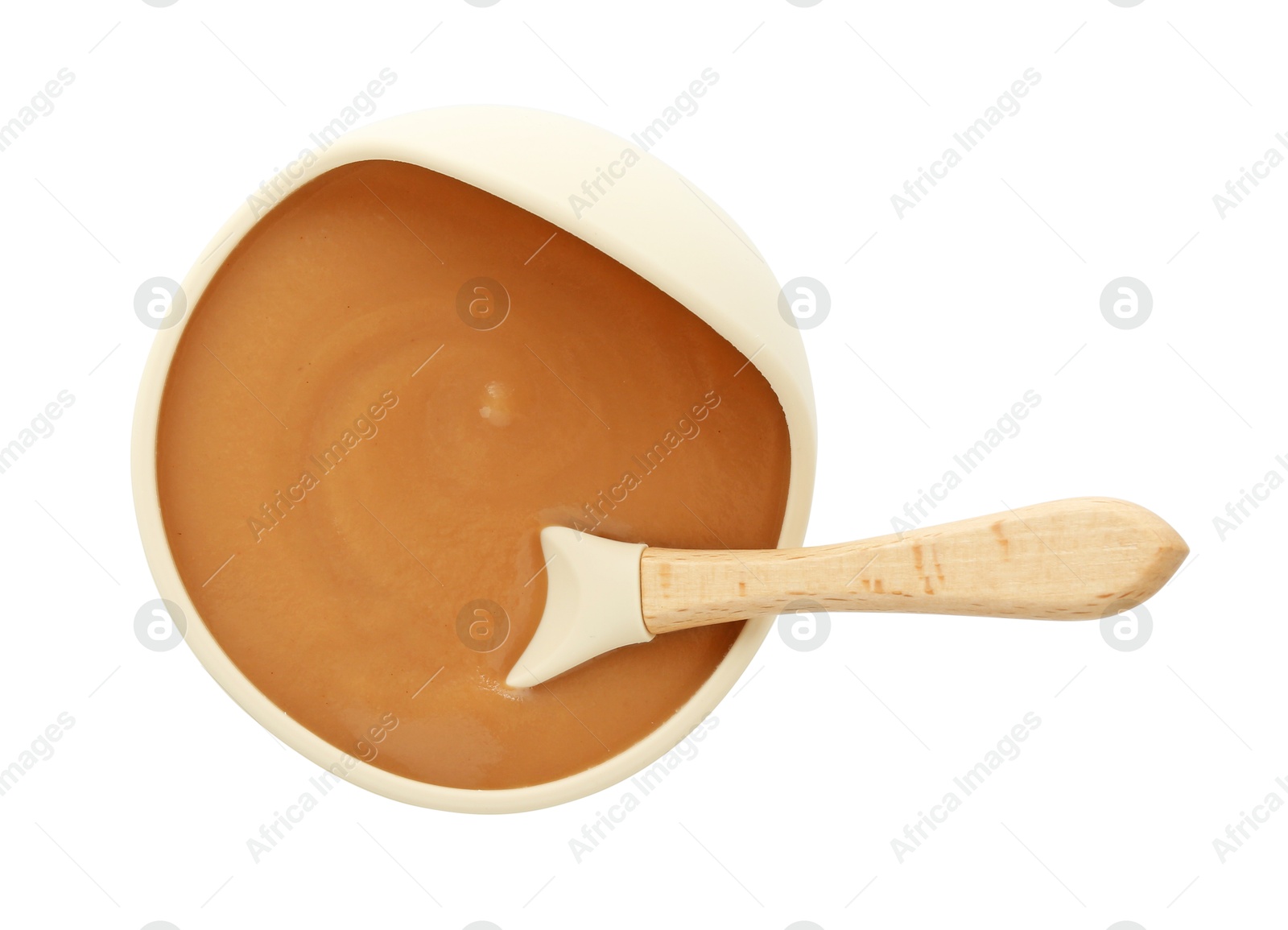 Photo of Tasty baby food in bowl and spoon isolated on white, top view