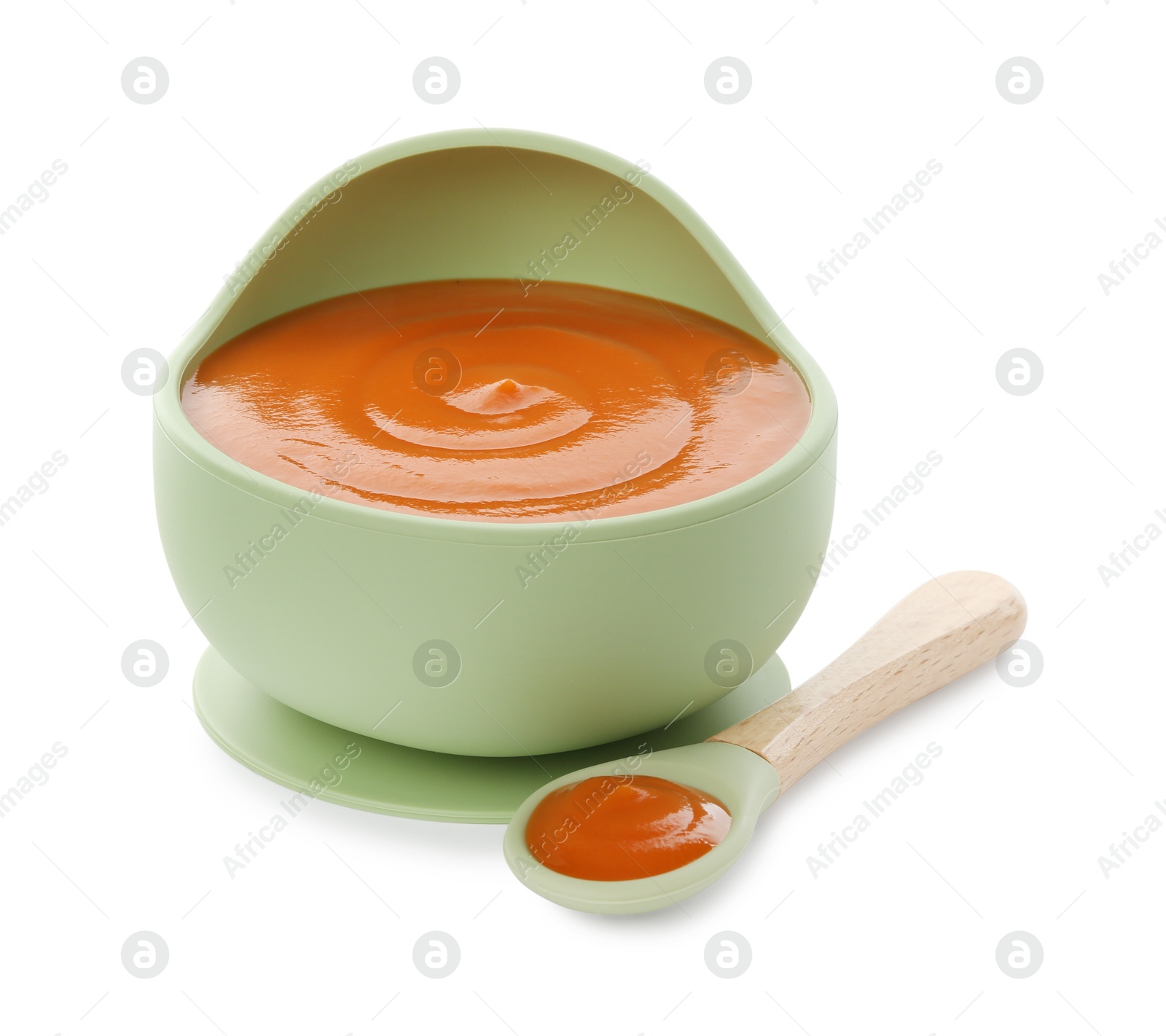 Photo of Tasty baby food in bowl and spoon isolated on white