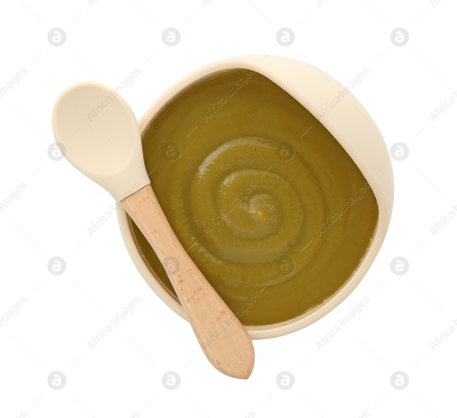 Photo of Tasty baby food in bowl and spoon isolated on white, top view