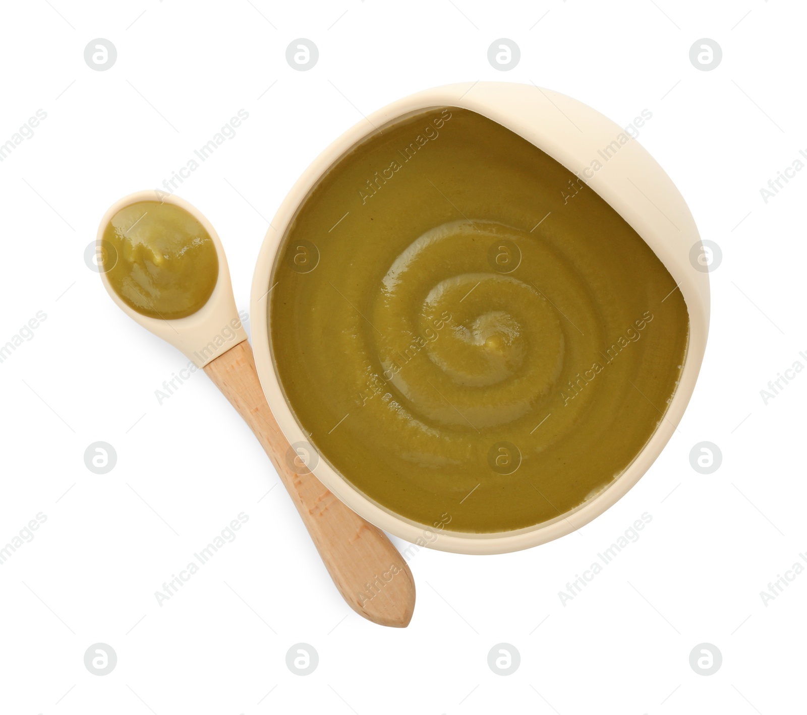 Photo of Tasty baby food in bowl and spoon isolated on white, top view