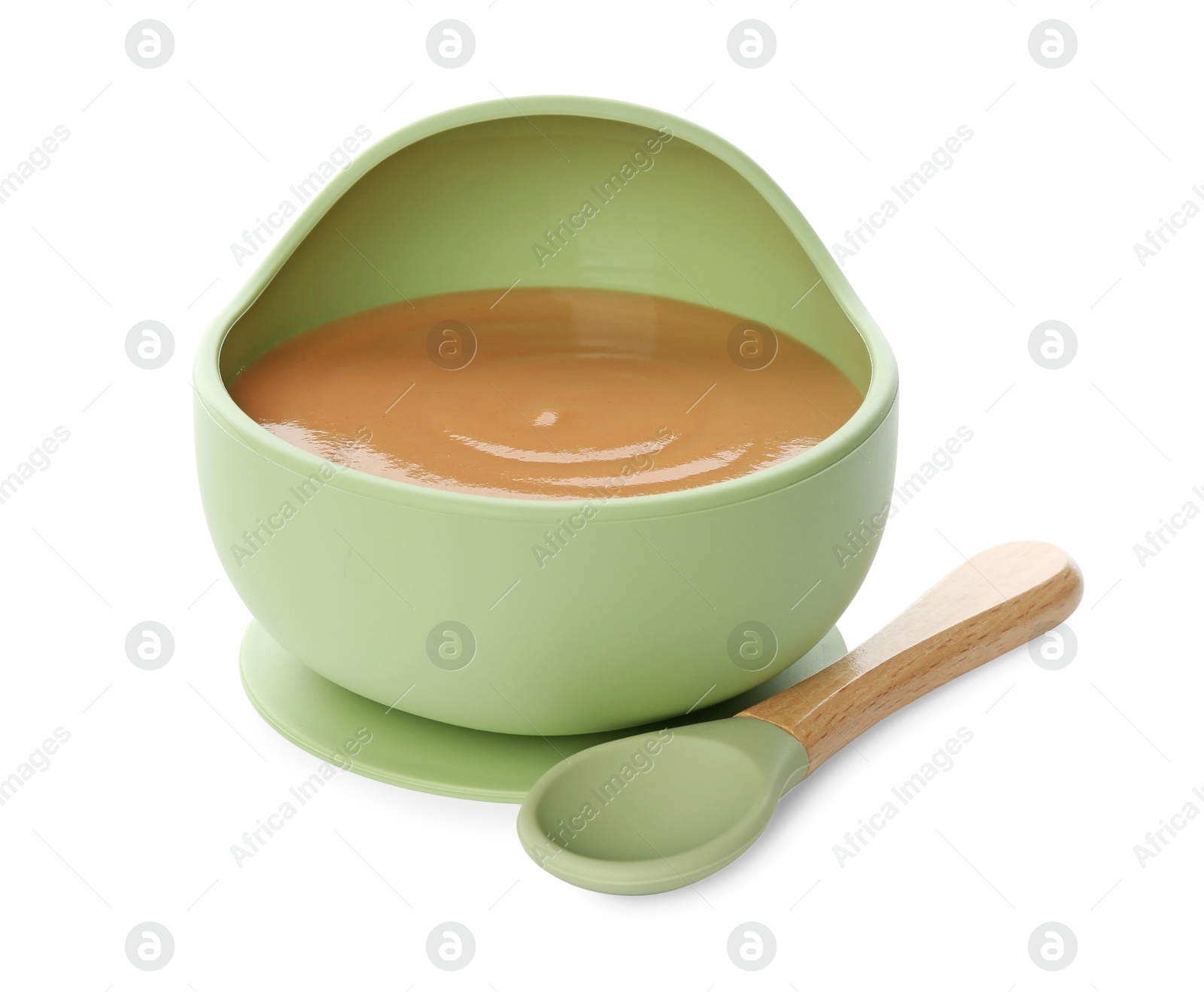 Photo of Delicious baby food in bowl and spoon isolated on white