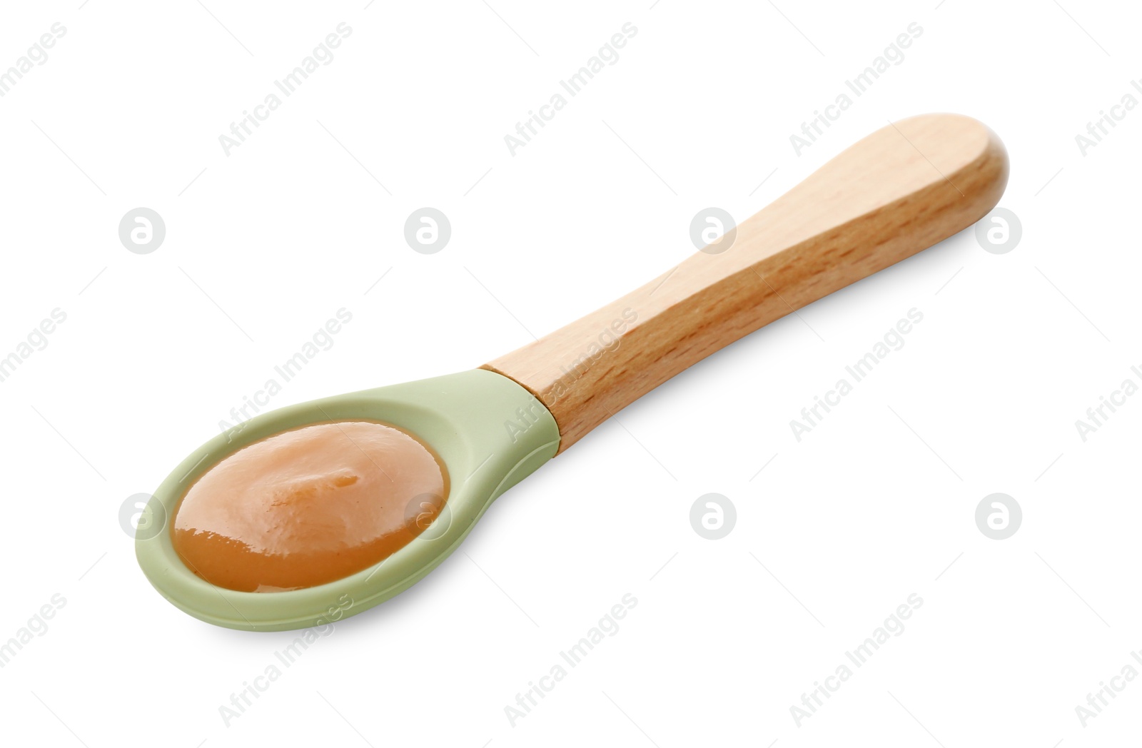 Photo of Delicious baby food in spoon isolated on white