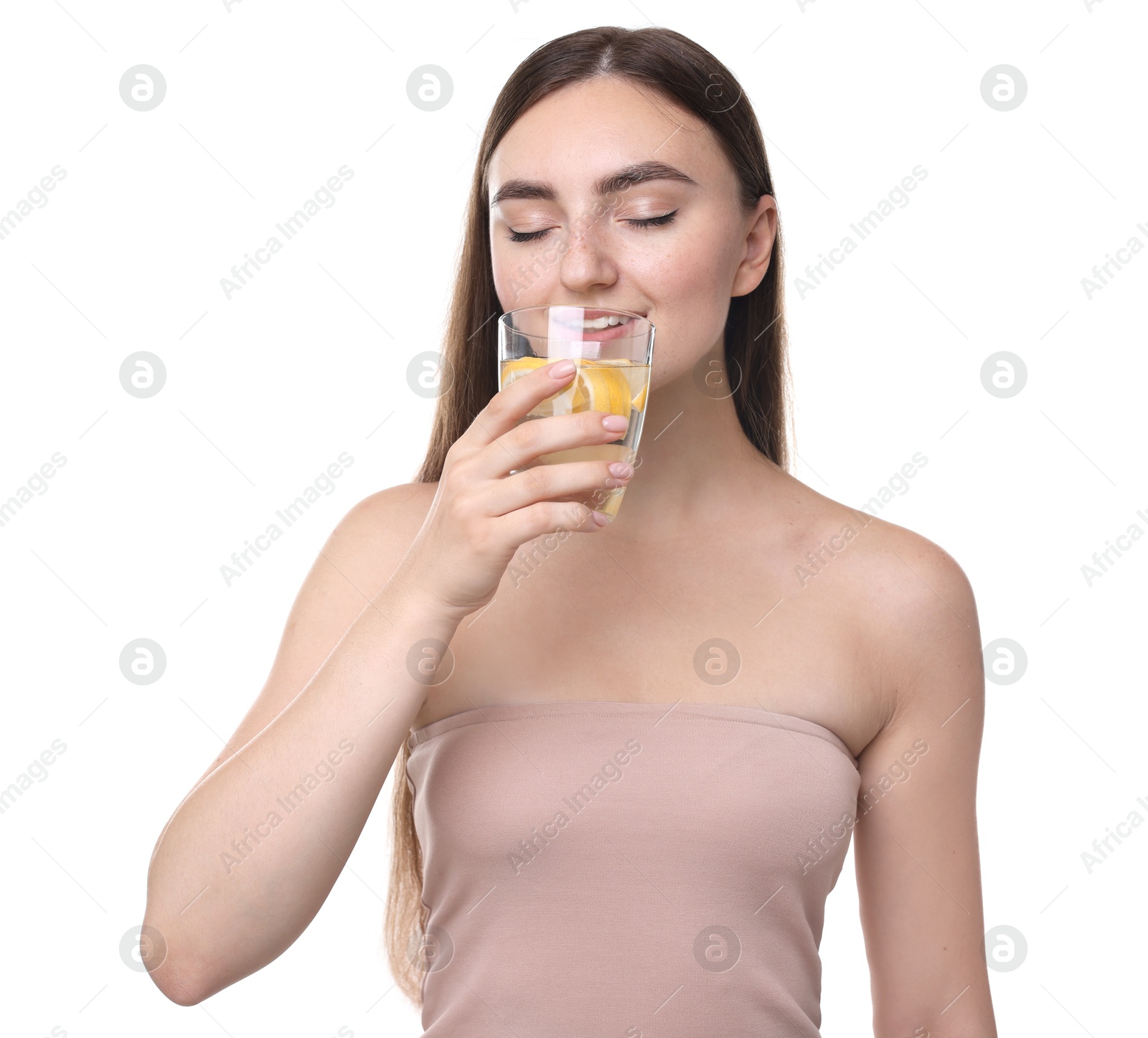 Photo of Woman drinking water with lemon on white background