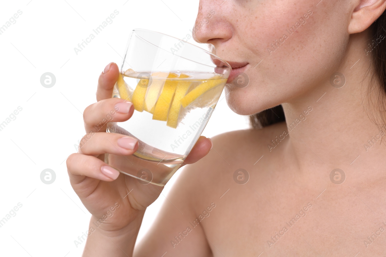 Photo of Woman drinking water with lemon on white background, closeup