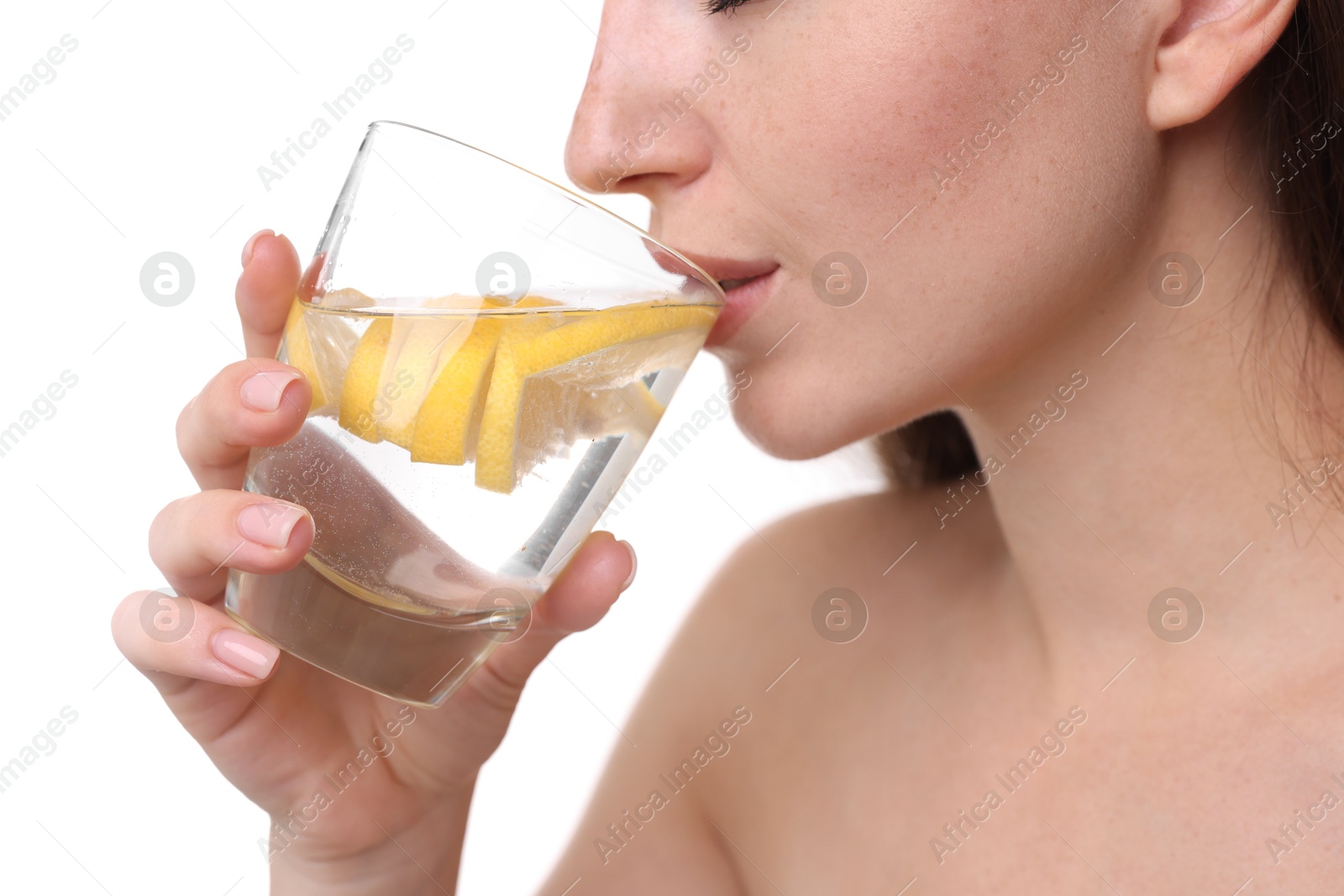 Photo of Woman drinking water with lemon on white background, closeup