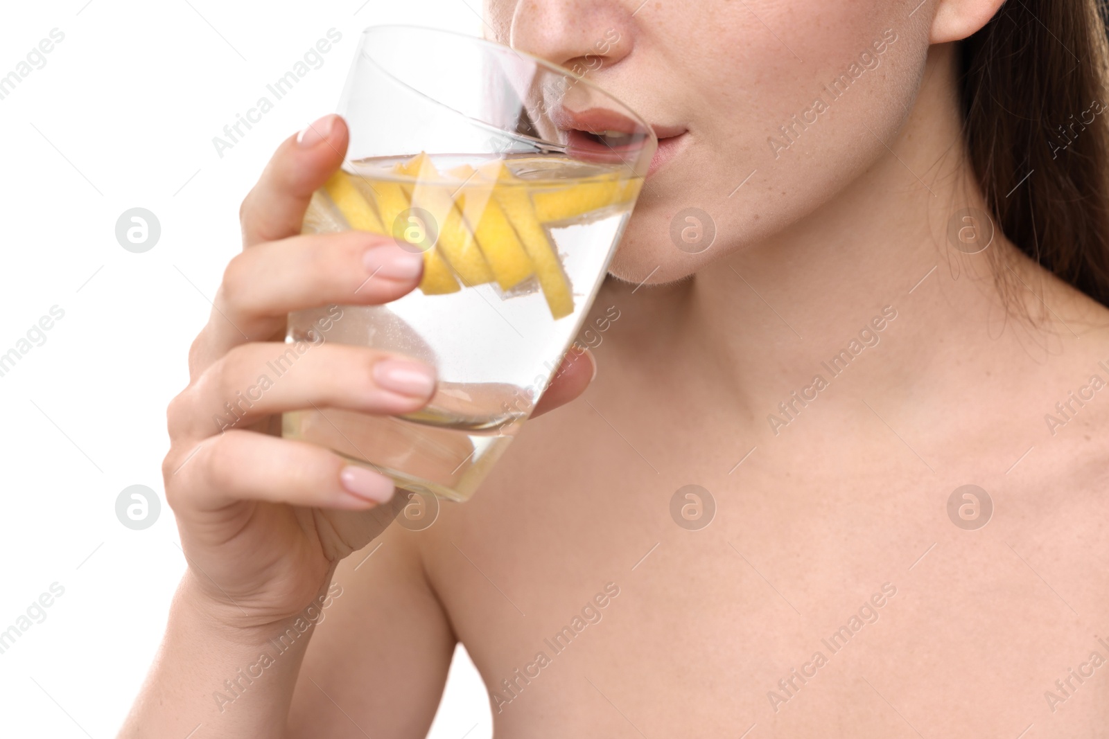 Photo of Woman drinking water with lemon on white background, closeup