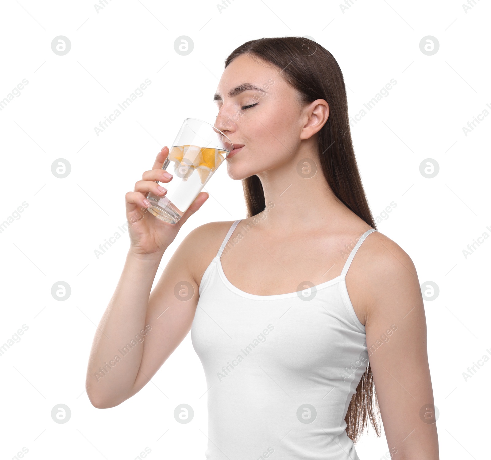 Photo of Woman drinking water with lemon on white background