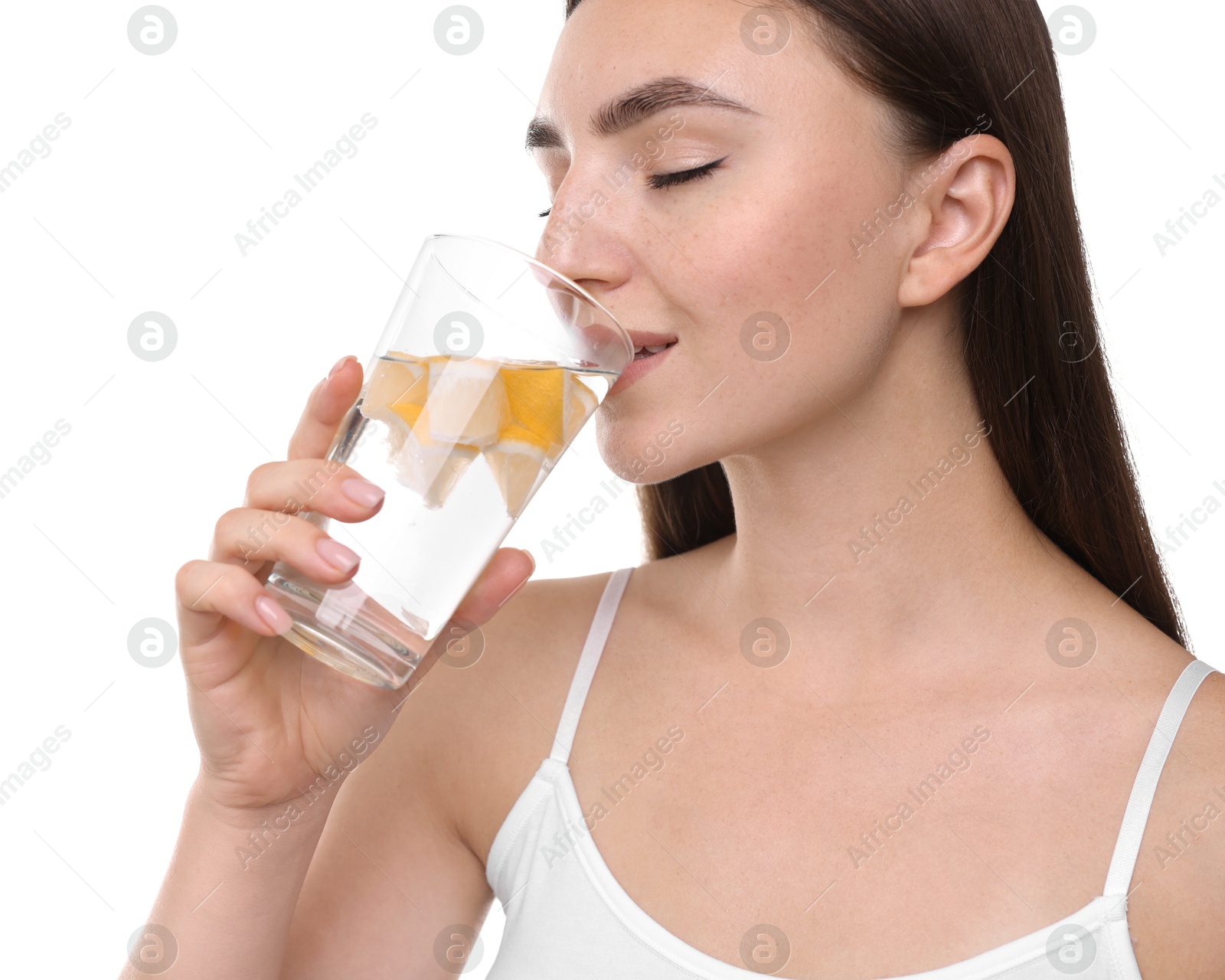 Photo of Woman drinking water with lemon on white background, closeup