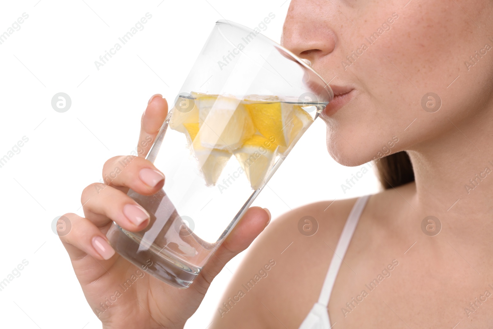 Photo of Woman drinking water with lemon on white background, closeup