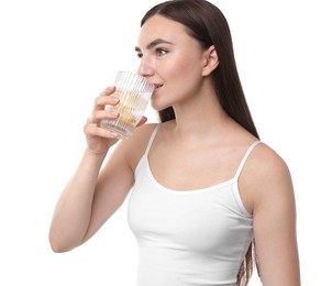 Woman drinking water with lemon on white background