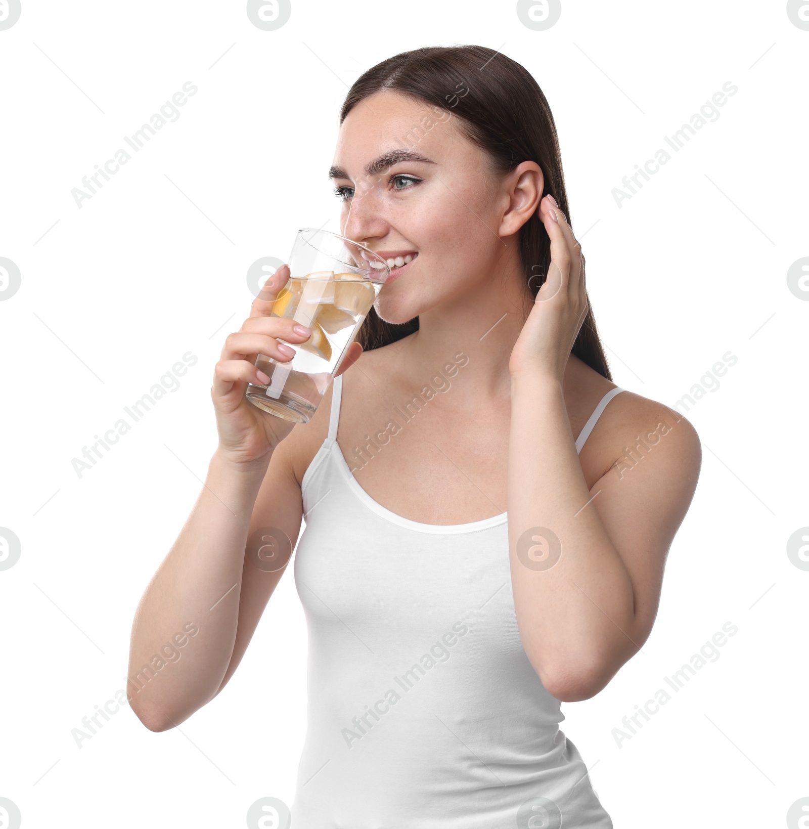 Photo of Woman drinking water with lemon on white background