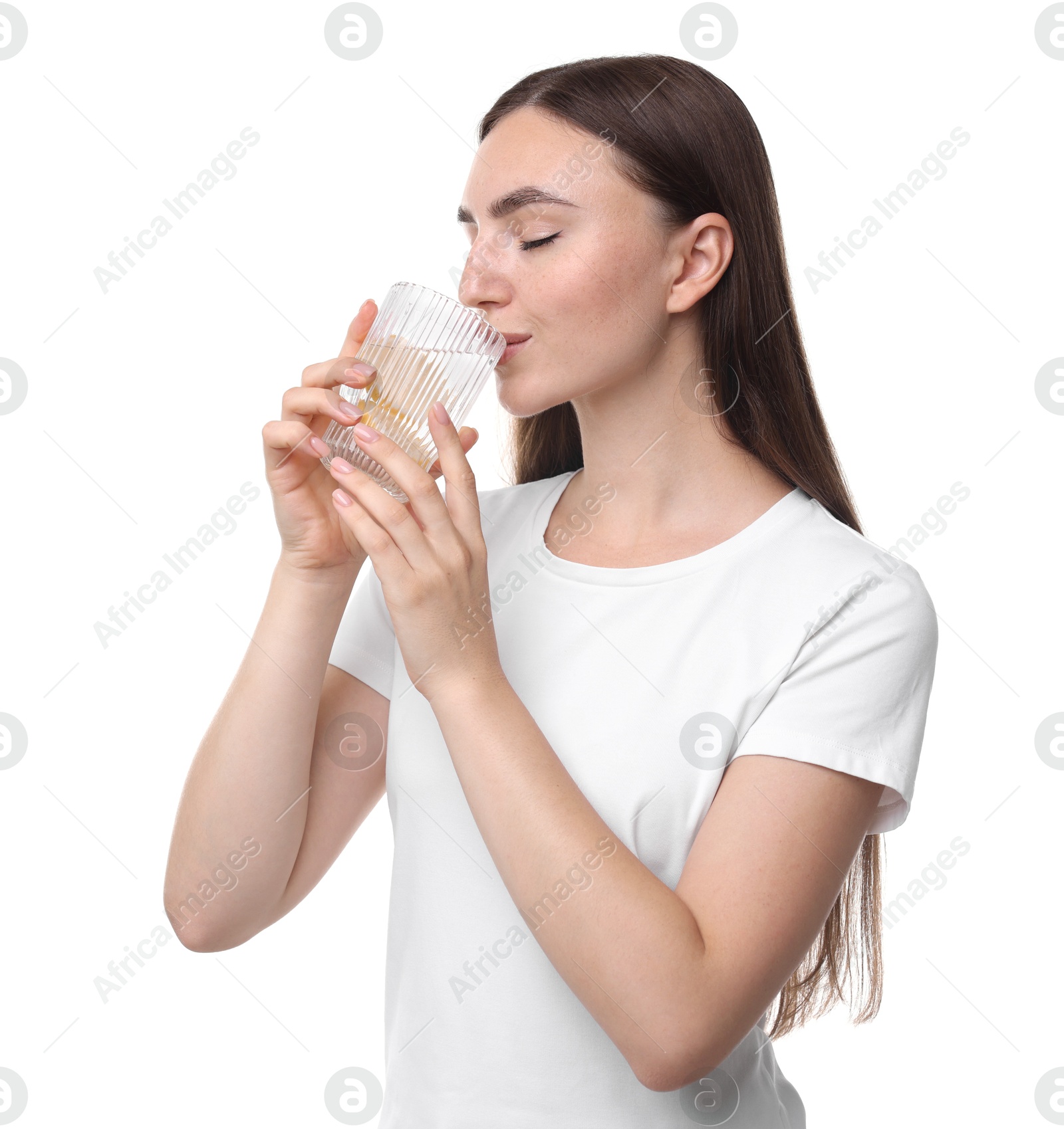 Photo of Woman drinking water with lemon on white background