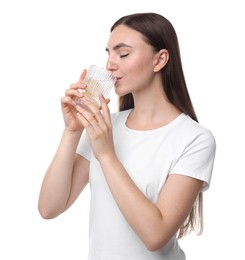 Woman drinking water with lemon on white background