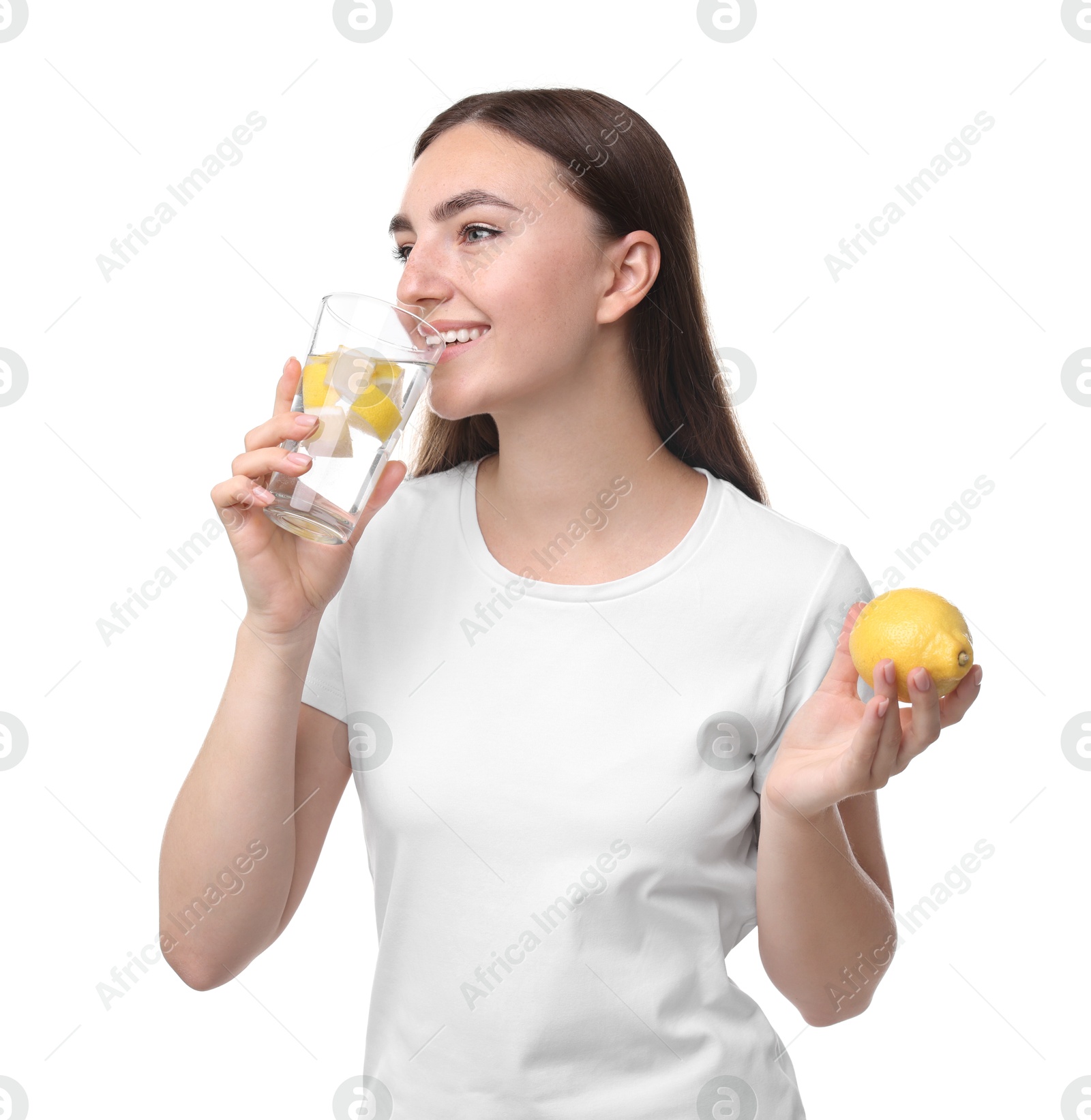 Photo of Woman drinking water with lemon on white background