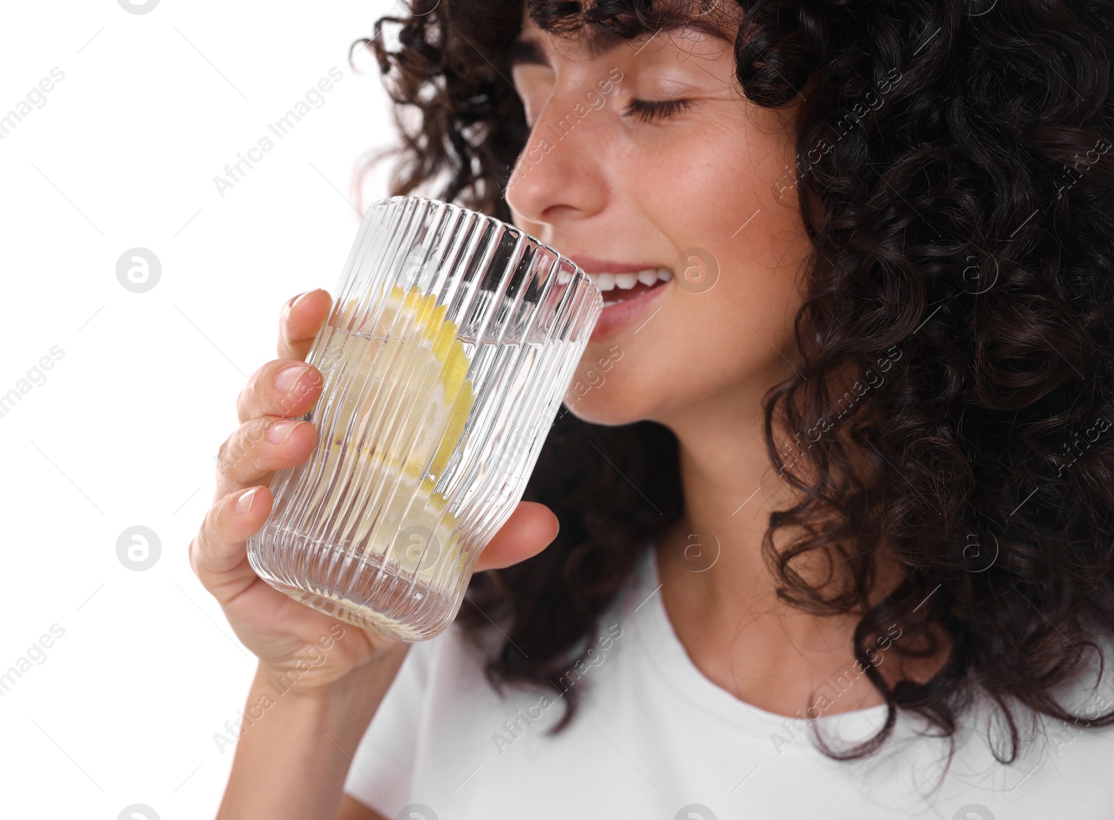 Photo of Woman drinking water with lemon on white background, closeup