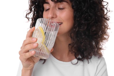 Photo of Woman drinking water with lemon on white background, closeup