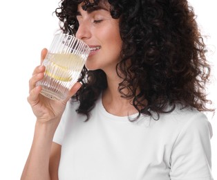 Photo of Woman drinking water with lemon on white background