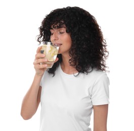 Photo of Woman drinking water with lemon on white background