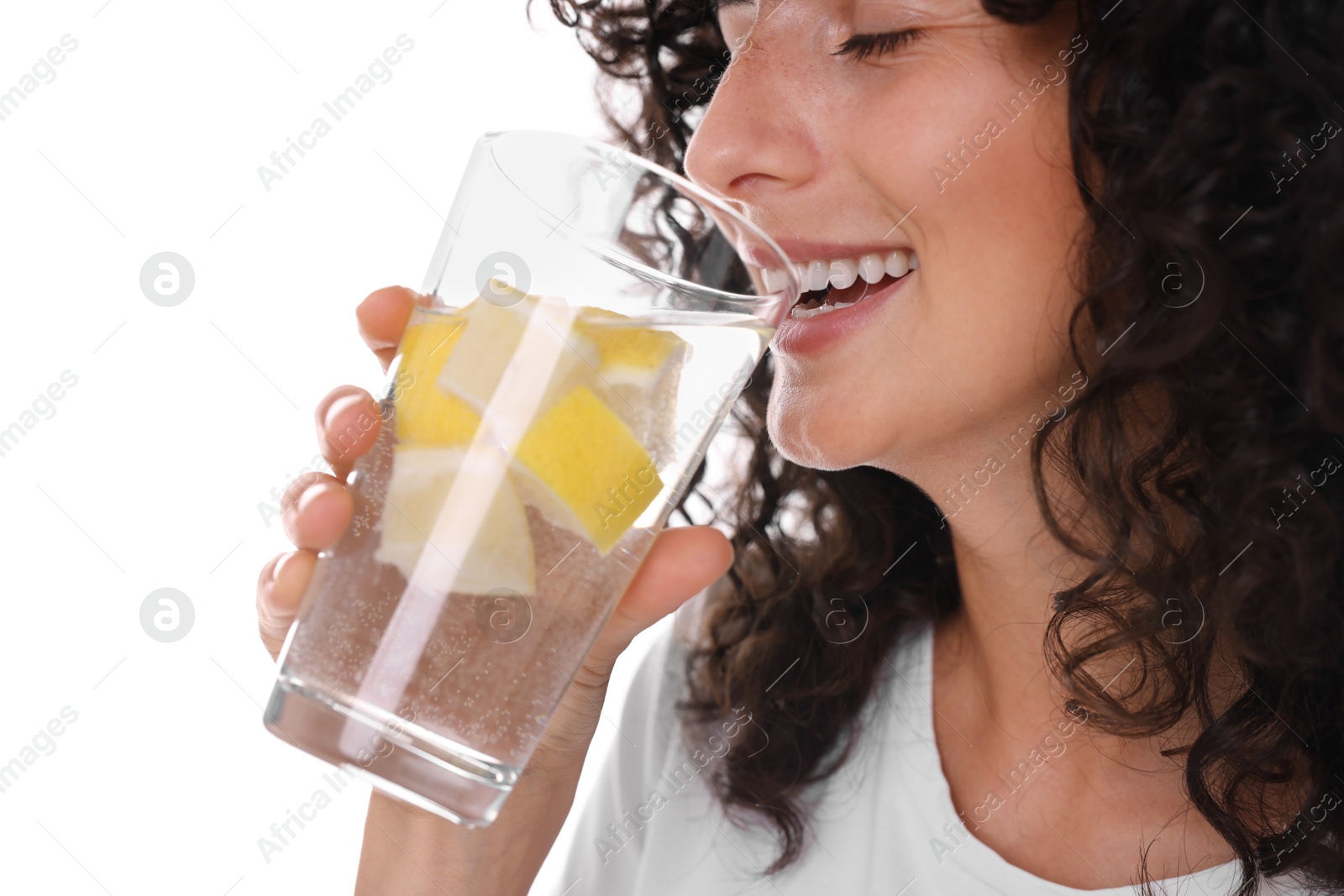 Photo of Woman drinking water with lemon on white background, closeup