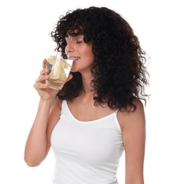 Photo of Woman drinking water with lemon on white background