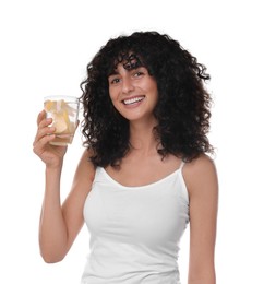 Photo of Woman with glass of lemon water on white background