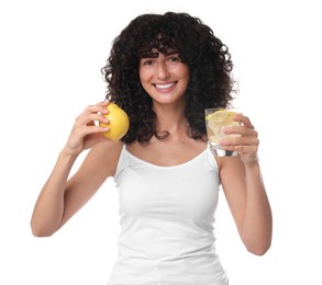 Woman with glass of lemon water and fruit on white background