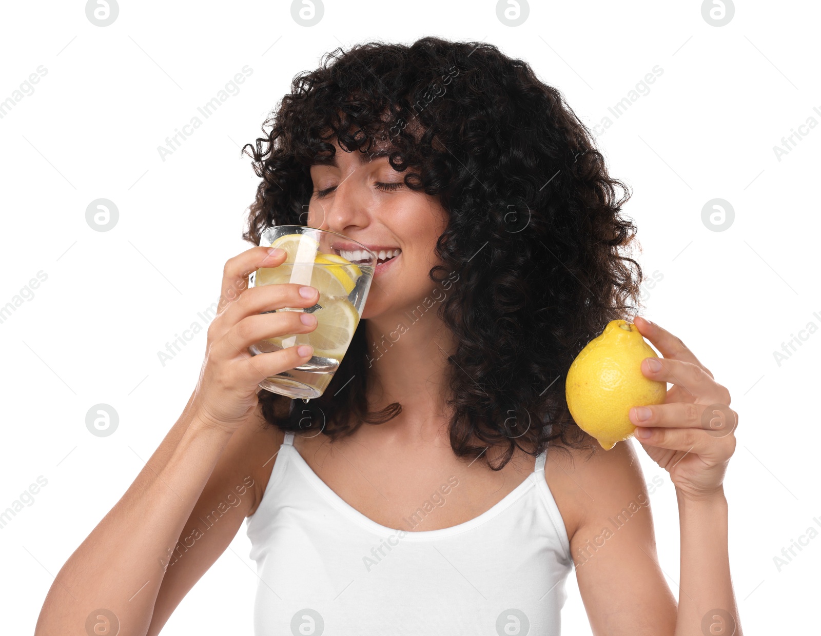 Photo of Woman drinking water with lemon on white background