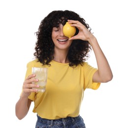 Photo of Woman with glass of lemon water and fruit on white background