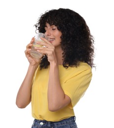 Photo of Woman drinking water with lemon on white background