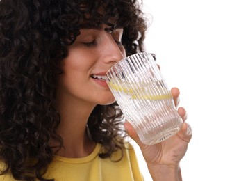 Woman drinking water with lemon on white background