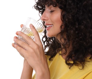 Woman drinking water with lemon on white background