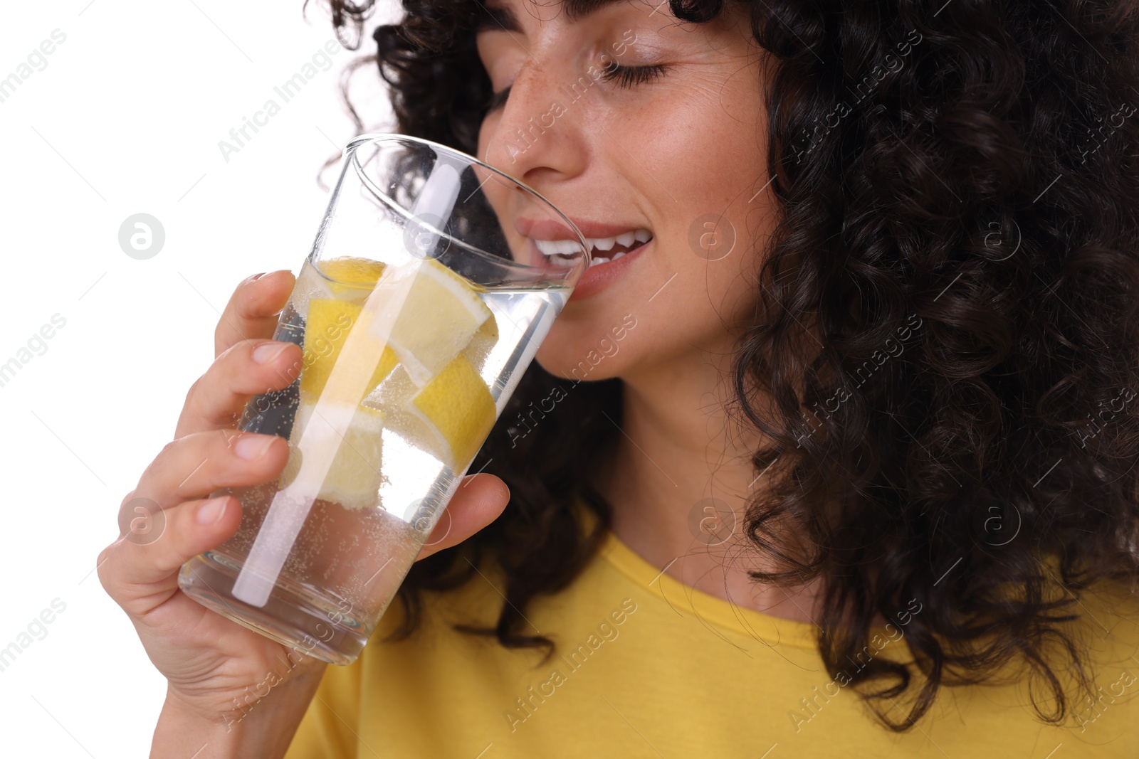 Photo of Woman drinking water with lemon on white background, closeup