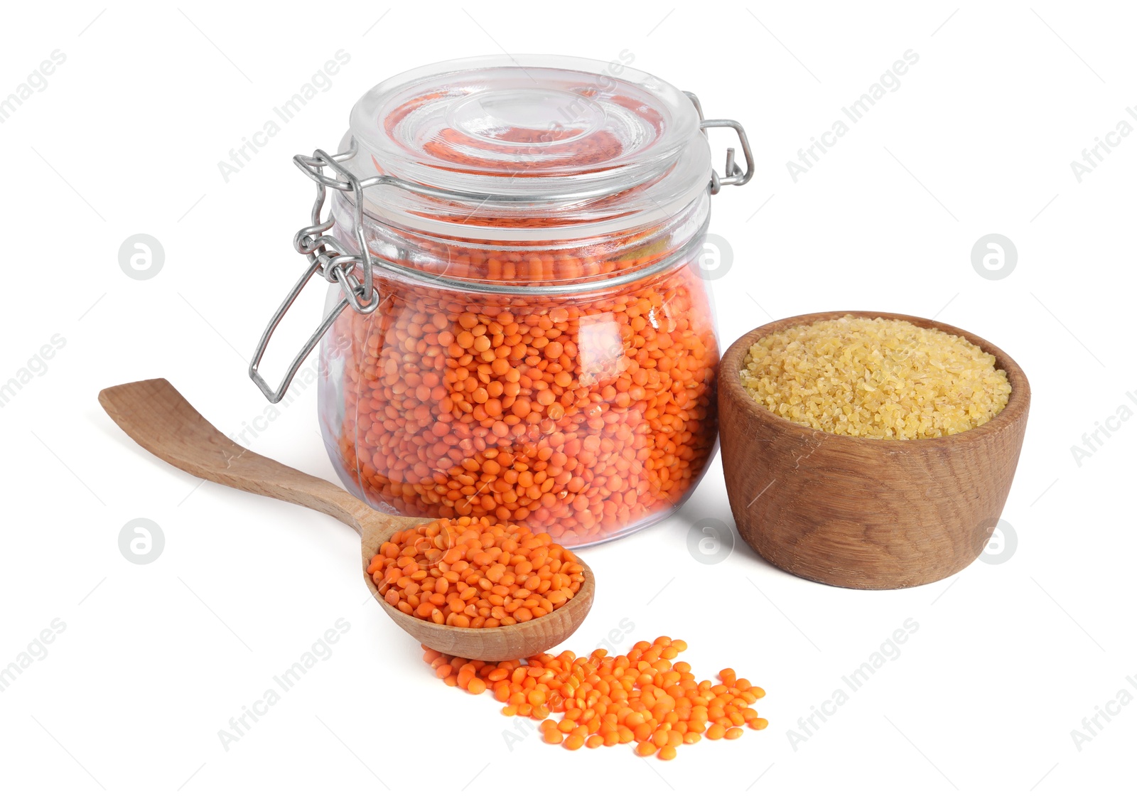 Photo of Raw lentils and bulgur isolated on white