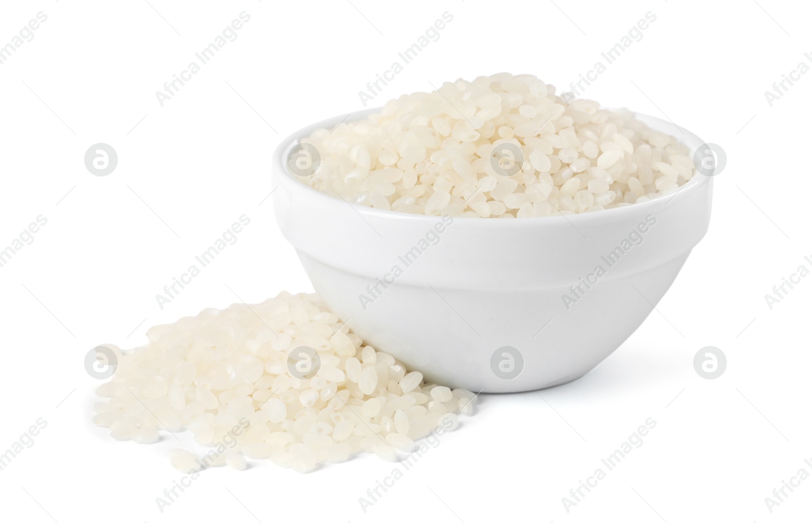 Photo of Raw rice in bowl isolated on white