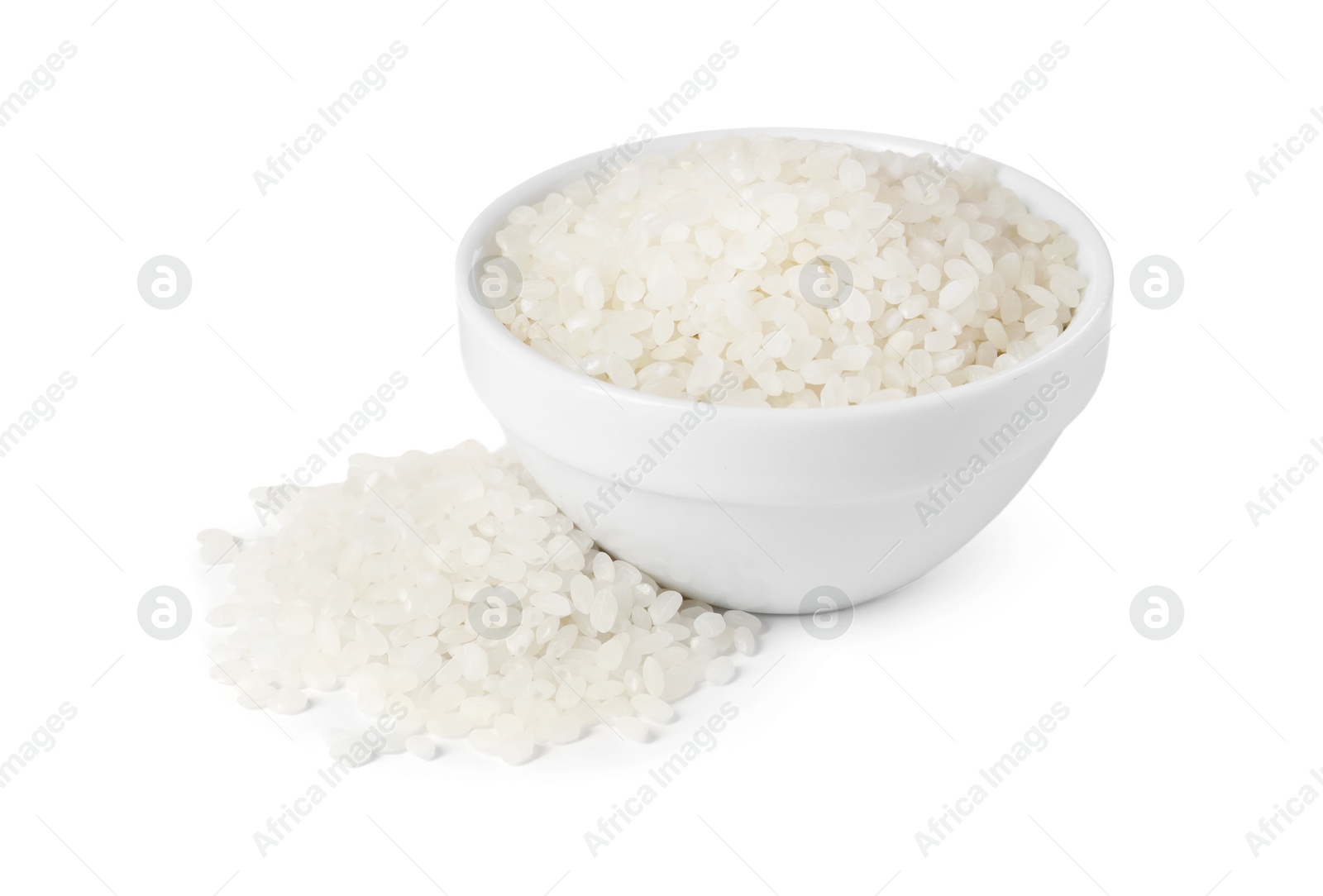 Photo of Raw rice in bowl isolated on white