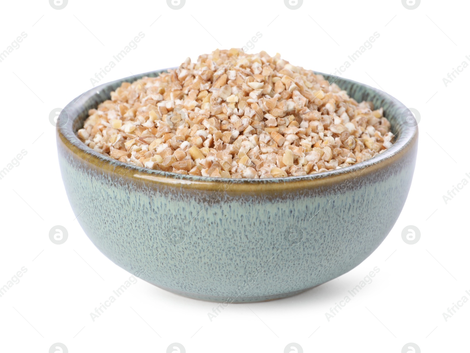 Photo of Dry wheat groats in bowl isolated on white