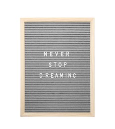 Letter board with phrase Never stop dreaming on white background, top view