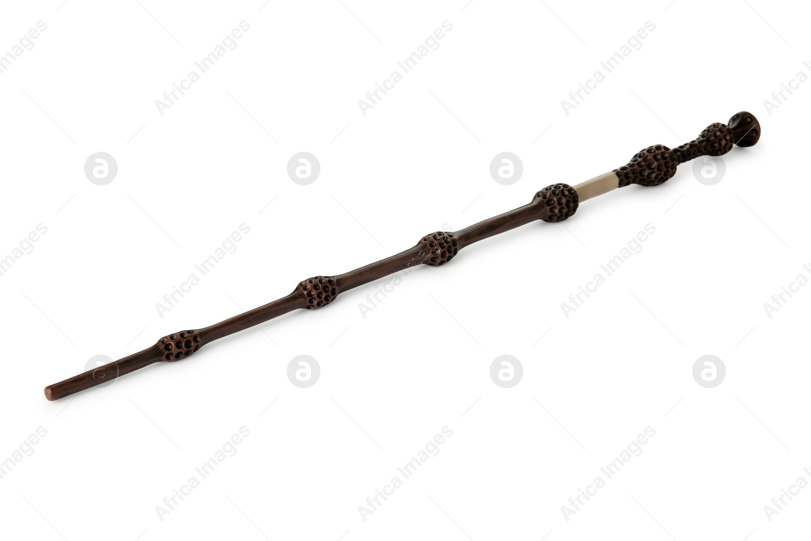 Photo of One wooden magic wand isolated on white