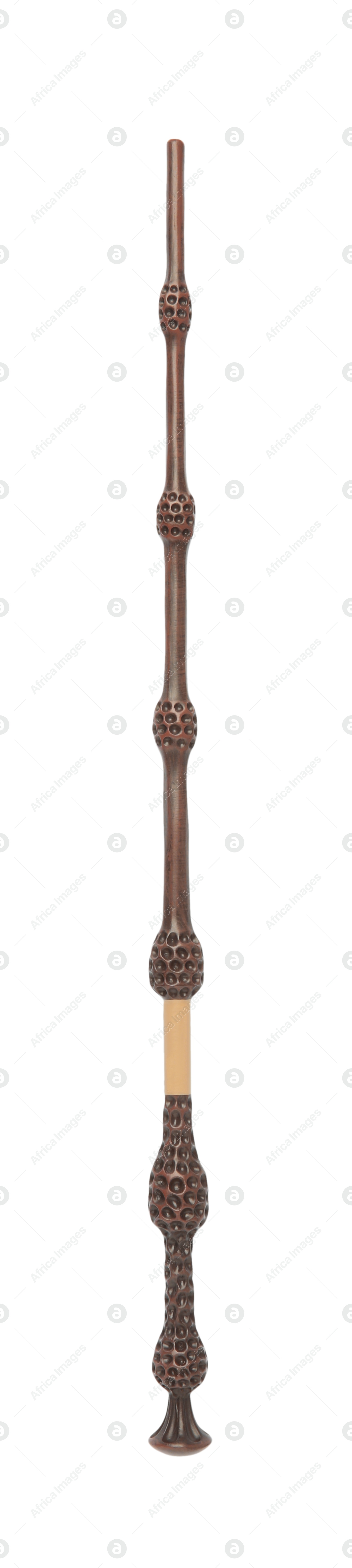 Photo of One wooden magic wand isolated on white, top view