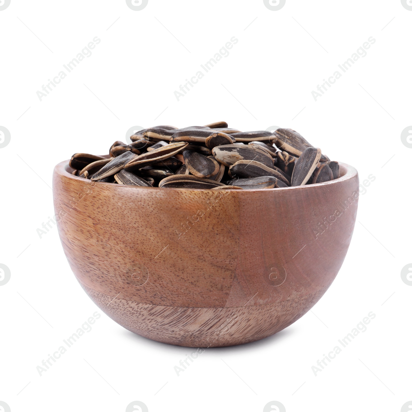 Photo of Sunflower seeds in wooden bowl isolated on white