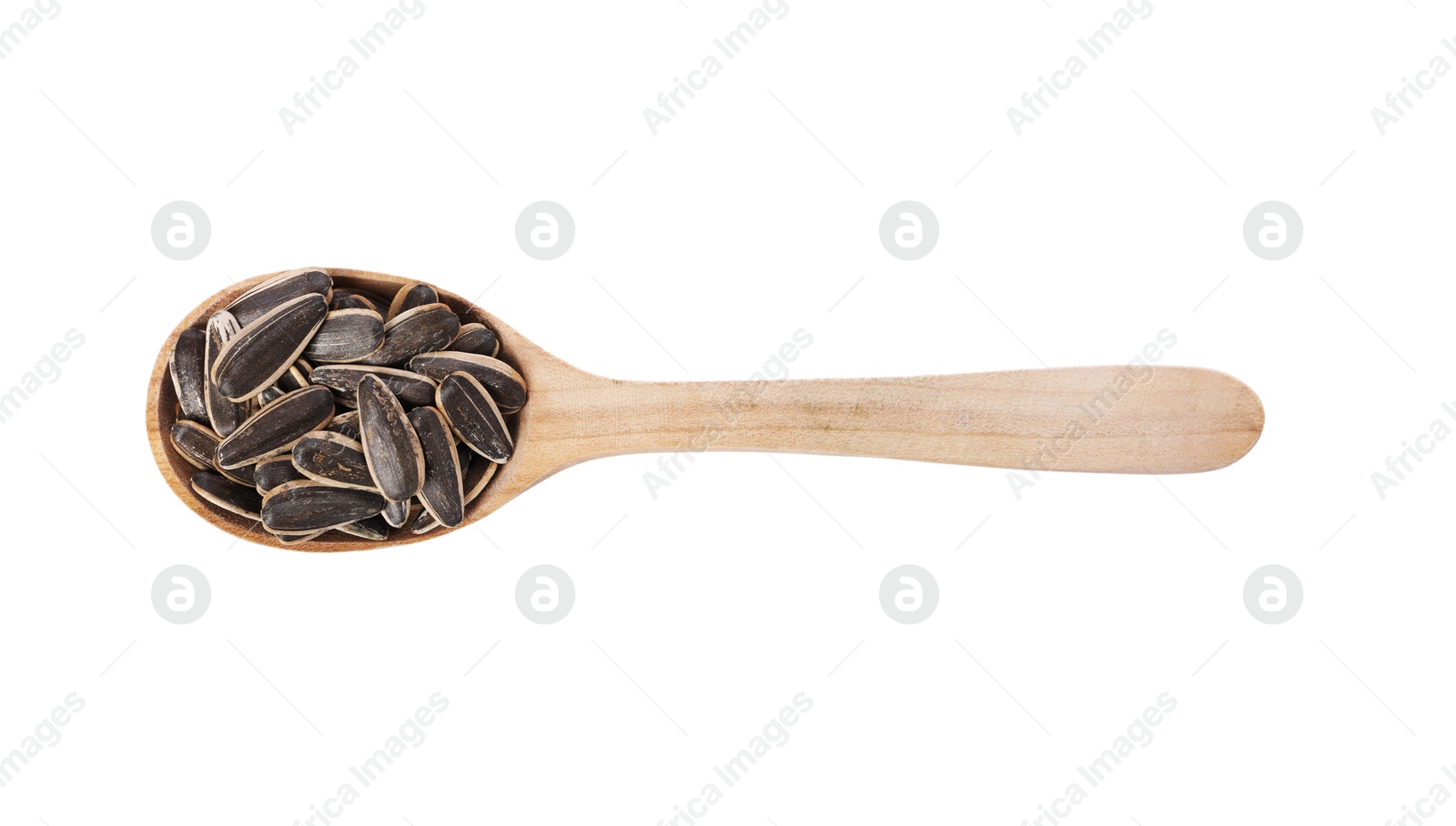 Photo of Sunflower seeds in wooden spoon isolated on white, top view